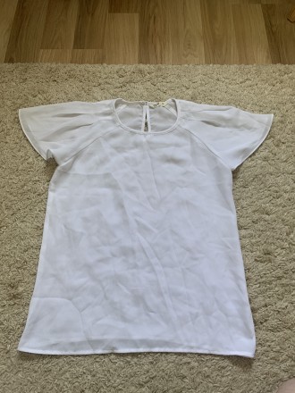 Блуза розмір XS. Стан гарний . Довжина 56,5 см, ширина 43 см. . фото 2