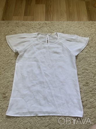 Блуза розмір XS. Стан гарний . Довжина 56,5 см, ширина 43 см. . фото 1