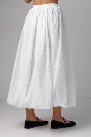 Длинная женская юбка с расширенным фасоном - это элегантный и женственный элемен. . фото 3