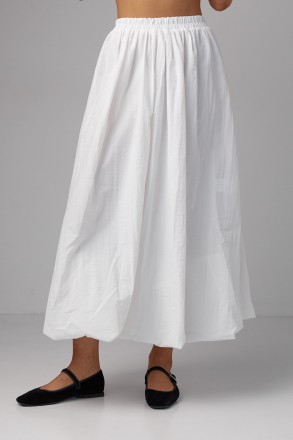 Длинная женская юбка с расширенным фасоном - это элегантный и женственный элемен. . фото 2