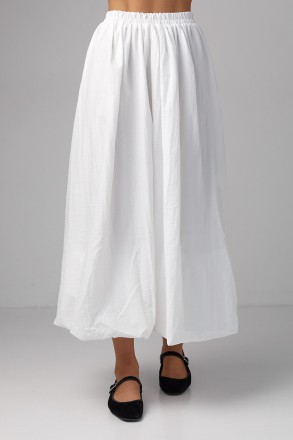 Длинная женская юбка с расширенным фасоном - это элегантный и женственный элемен. . фото 8