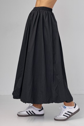 Длинная женская юбка с расширенным фасоном - это элегантный и женственный элемен. . фото 6