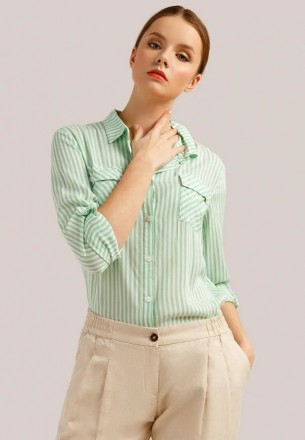 Легкая стильная женская блуза свободного кроя, застегивается на пуговицы. Подход. . фото 2