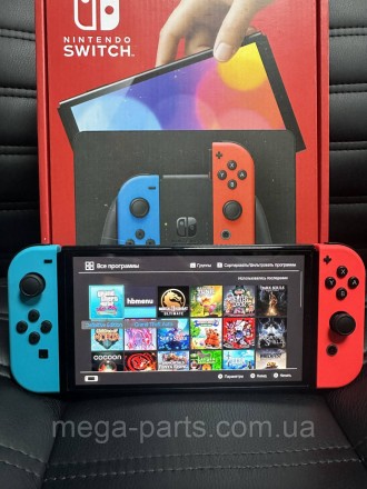 Портативна ігрова приставка Nintendo Switch OLED with Neon Blue and Neon Red Joy. . фото 3