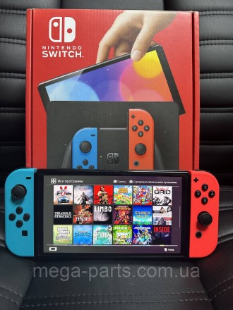 Портативна ігрова приставка Nintendo Switch OLED with Neon Blue and Neon Red Joy. . фото 4