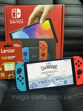 Портативна ігрова приставка Nintendo Switch OLED with Neon Blue and Neon Red Joy. . фото 5