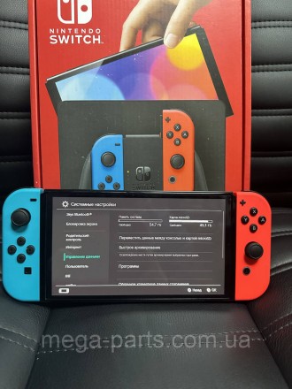 Портативна ігрова приставка Nintendo Switch OLED with Neon Blue and Neon Red Joy. . фото 7