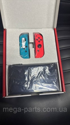 Портативна ігрова приставка Nintendo Switch OLED with Neon Blue and Neon Red Joy. . фото 6