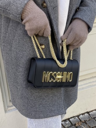 
ВИДЕООБЗОР
Женская классическая сумка MCSOHINO
Сумочка на два отделения выполне. . фото 7