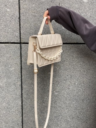 
Женская сумка на одно отделение на тонком ремешке
Параметры - высота 15 см, дли. . фото 6