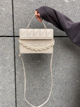
Женская сумка на одно отделение на тонком ремешке
Параметры - высота 15 см, дли. . фото 3