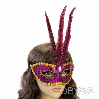 Здавна венеціанські маски використовувалися для балів та карнавалів. Люди за доп. . фото 1