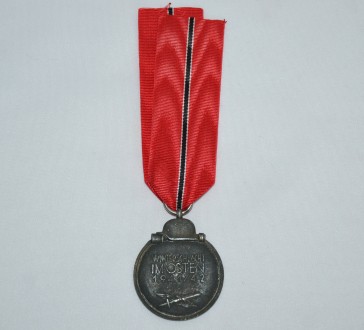 Медали За зимнюю кампанию на Востоке 1941/42
Клеймо"6"
Лента копия.. . фото 4