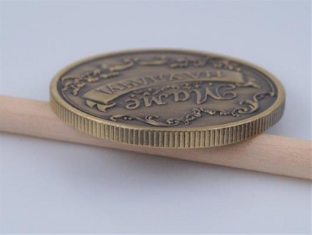 Монета сувенирная "Золотая Мама". Диаметр монеты 4,00 см., толщина 0,30 см., вес. . фото 5