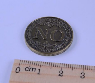 Монета сувенирная "YES NO"(цвет - бронза). Диаметр монеты 2,50 см., толщина 0,20. . фото 3