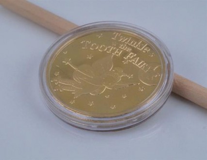 Монета сувенірна "Зубна фея". Діаметр монети 4,00 см, товщина 0,30 см, вага 29.6. . фото 2