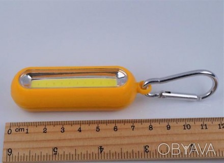 Светодиодный брелок-фонарь на батарейке (1 шт. ААА, в комплект не входит). Три р. . фото 1
