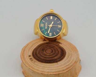 Часы-кольцо на палец кварцевые золотые, с зеленым циферблатом и растягивающимся . . фото 4