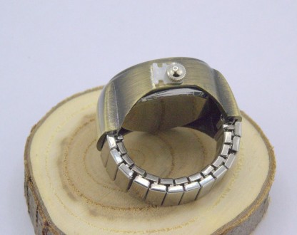 Часы-кольцо на палец кварцевые, цвет - бронзовый, с бежевым циферблатом и растяг. . фото 5