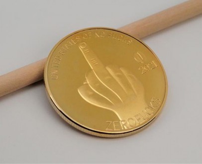 Монета сувенирная "FUCK". Диаметр монеты 4,00 см., толщина 0,30 см., вес 29.50 г. . фото 2