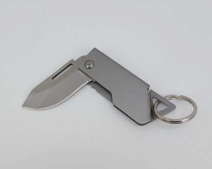 Брелок-нож на ключи (цвет - серебро, материал - металл). Длина общая в сложенном. . фото 8