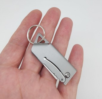 Брелок-нож на ключи (цвет - серебро, материал - металл). Длина общая в сложенном. . фото 3