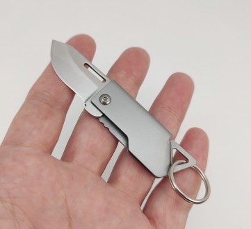 Брелок-нож на ключи (цвет - серебро, материал - металл). Длина общая в сложенном. . фото 2
