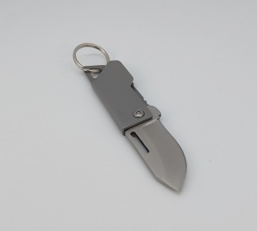Брелок-нож на ключи (цвет - серебро, материал - металл). Длина общая в сложенном. . фото 10