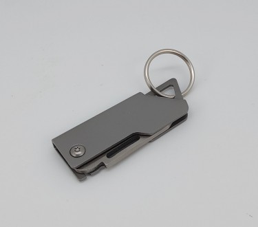 Брелок-нож на ключи (цвет - серебро, материал - металл). Длина общая в сложенном. . фото 5