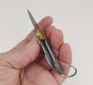 Нож карманный (складной) с открывалкой. Длина ножа в сложенном состоянии 6,20 см. . фото 4