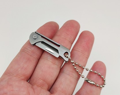 Брелок-нож на ключи (металлический). Длина в сложенном виде 4,20 см., длина в вы. . фото 7