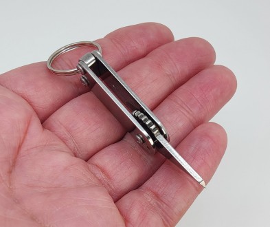 Нож-мини на ключи, металл. Длина в сложенном состоянии 4,20 см., в открытом 6,00. . фото 5