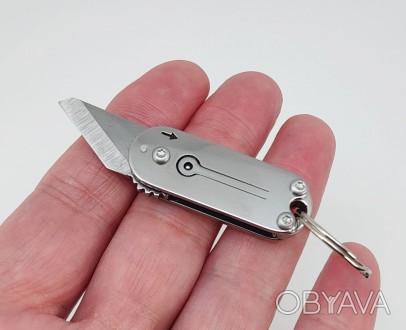 Нож-мини на ключи, металл. Длина в сложенном состоянии 4,20 см., в открытом 6,00. . фото 1