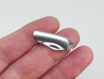Брелок-нож на ключи (цвет - Серебро, материал - металл). Длина общая в сложенном. . фото 5