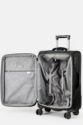 Тканьевый чемодан имеют выдвижную, двухуровневую телескопическую ручку и 4 бесшу. . фото 6