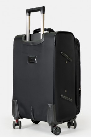 Тканьевый чемодан имеют выдвижную, двухуровневую телескопическую ручку и 4 бесшу. . фото 5