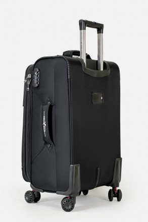 Тканьевый чемодан имеют выдвижную, двухуровневую телескопическую ручку и 4 бесшу. . фото 4