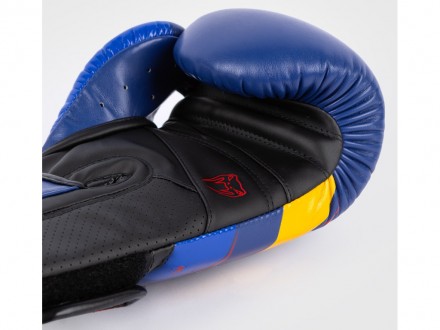 Описание:
12, 14 унций
Перчатки тренировочные VENUM Elite Evo Boxing Gloves - эт. . фото 6