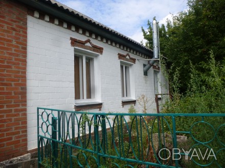 Продам дом в центре г. Змиева
