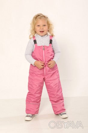 Зимний детский полукомбинезон для девочки розового цвета
Модель полукомбинезона . . фото 1
