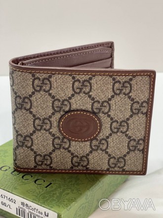 
 
 Кошелёк Gucci коллекция Aria блестяще объединяет классические элементы бренд. . фото 1