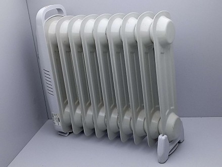 Масляные обогреватели распространяют тепло за счет нагревания маслом металлическ. . фото 5