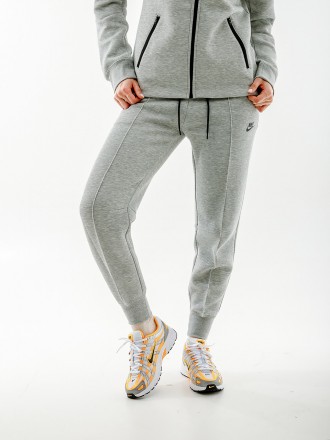 Женские Брюки Nike NS TCH FLC MR JGGR Серый XS (7dFB8330-063 XS). Шостка. фото 1 Женские Брюки Nike NS TCH FLC MR JGGR Серый XS (7dFB8330-063 XS). Шостка. фото 1