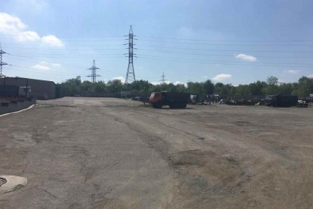 Сдам асфальтируемый участок на закрытой територии.. Дніпро. фото 1 Сдам асфальтируемый участок на закрытой територии.. Дніпро. фото 1