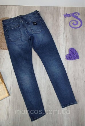 Мужские синие джинсы Calvin Klein модель Slim Taper. 
Застёжка пуговицы и молния. . фото 6