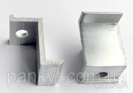 Притиск міжмодульний. Притиск міжпанельний.