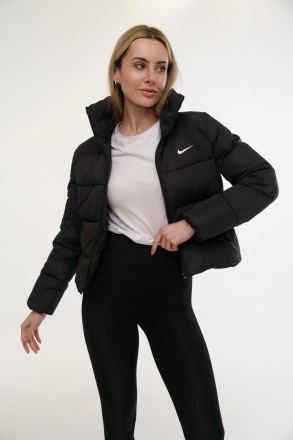 
Жіноча вкорочена куртка Nike &ndash; стиль, комфорт та тепло у кожній деталі.Ця куртк. . фото 5