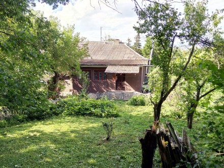 Продам частину будинку з окремим входом і загородженою територією.

с.Миколаїв. Николаев. фото 8