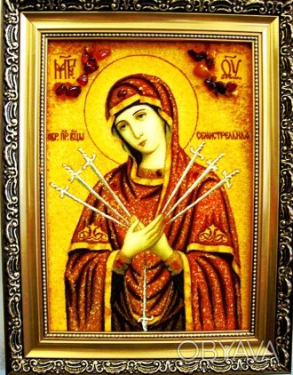 На этой иконе, выполненной из янтарной крошки, изображена Божья Матерь, пронзённ. . фото 1