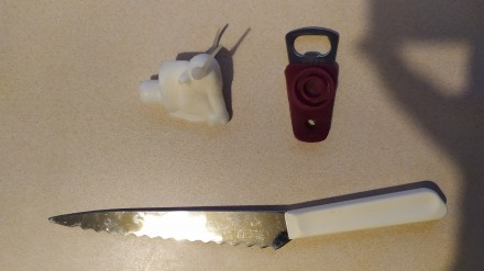 Кухонный нож из настоящей высококачественной нержавеющей стали. Есть надпись.
И. . фото 4